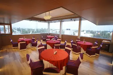 Rooftop banquet dining with sunset view at Bloft Hotel Vellore